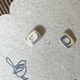 Tiny silver 'x o' studs